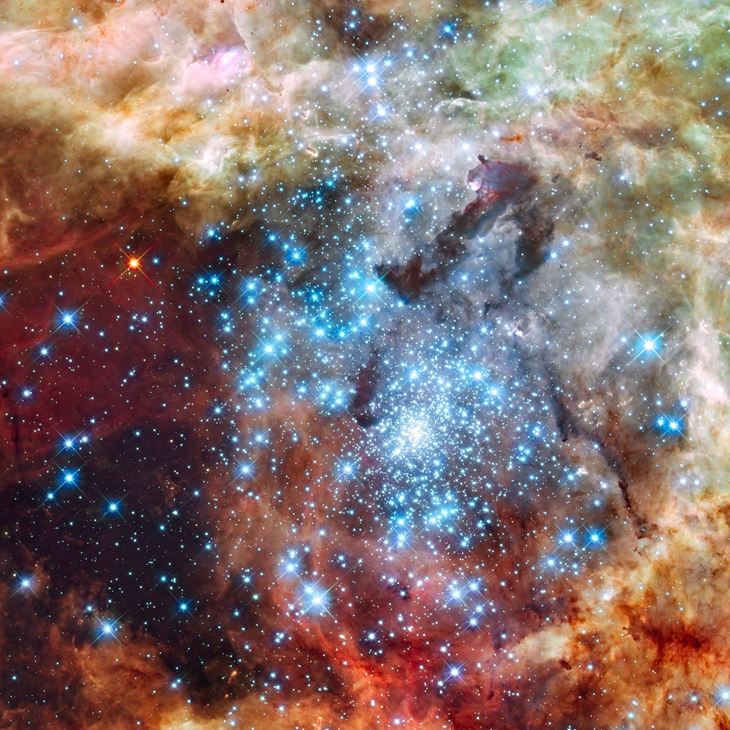 30 Doradus, the Tarantula Nebula: young blue stars amid glowing clouds of gas in the Large Magellanic Cloud