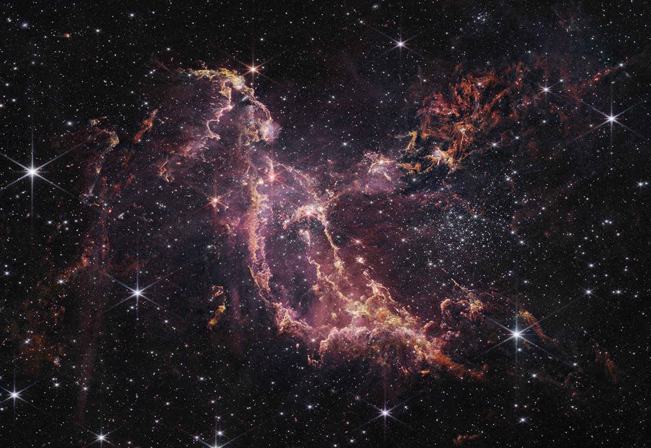 NGC 346, a young star cluster forming in the Small Magellanic Cloud
